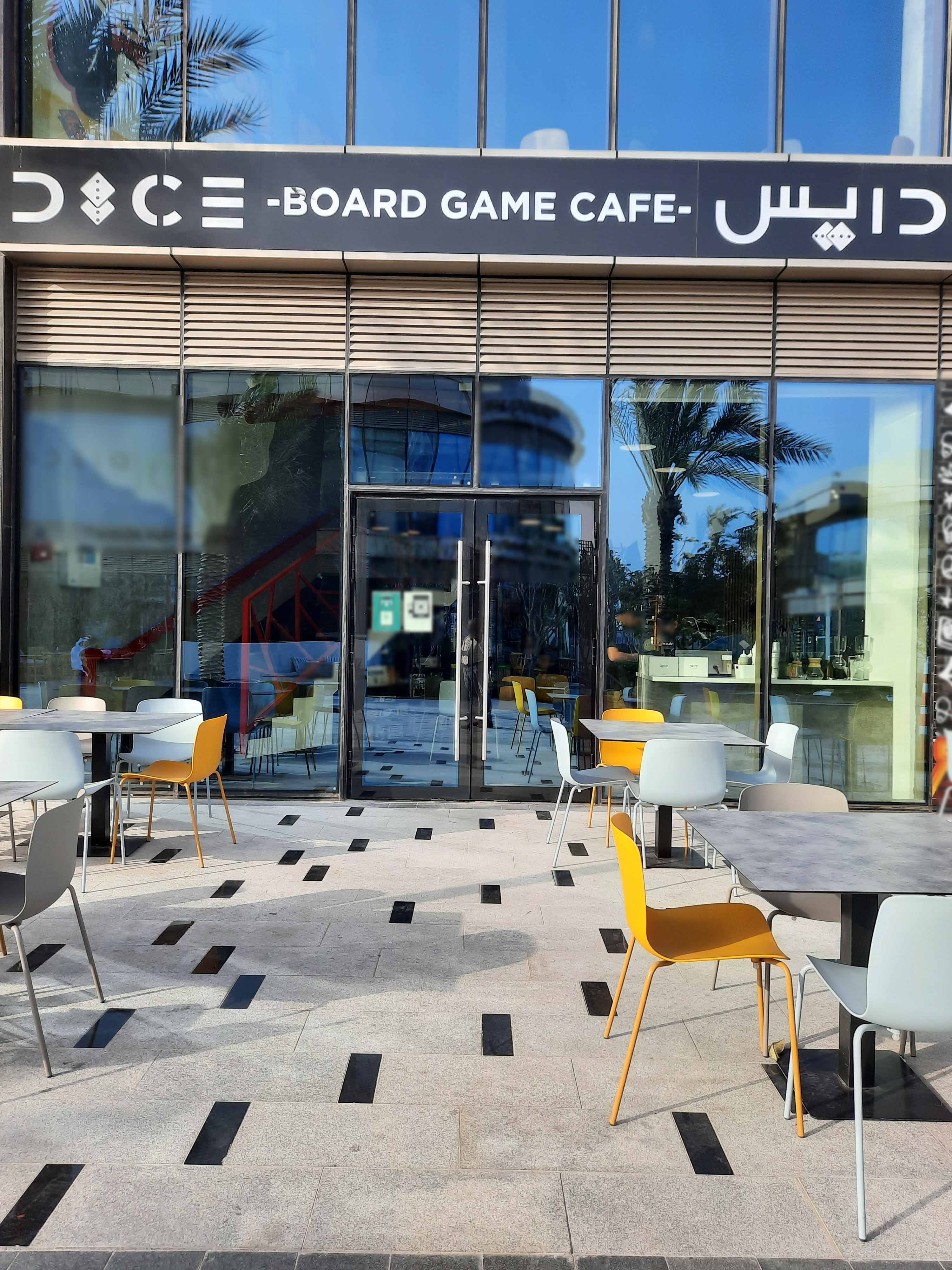 DICE café entrance and outdoor tables in Sheikha Fatima Park